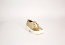 Zapato dorado con plataforma